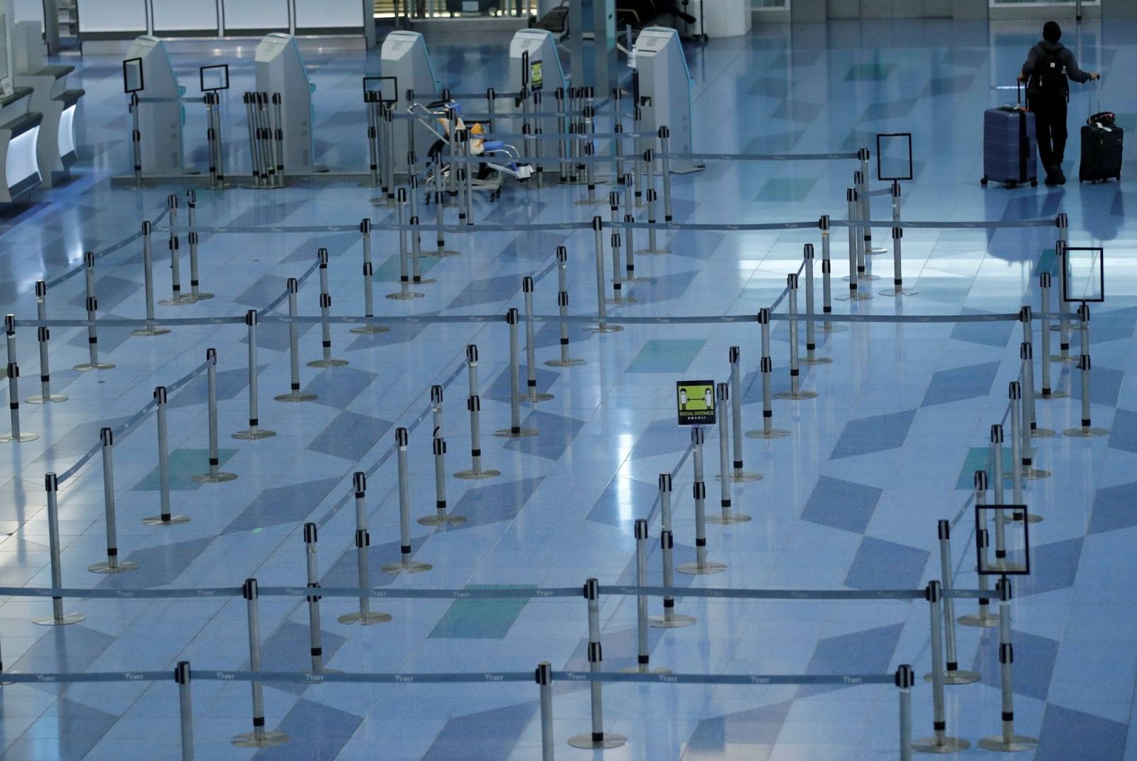 Japan to shorten quarantine period for international arrivals to 10 days